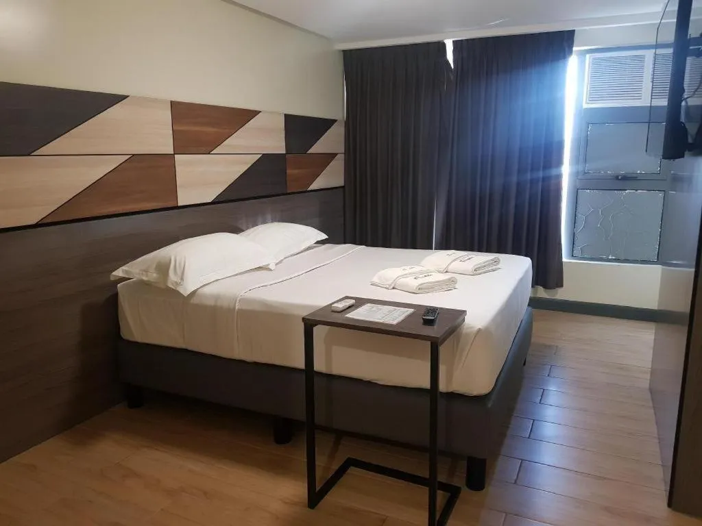 Bed in Travelite Hotel Legarda