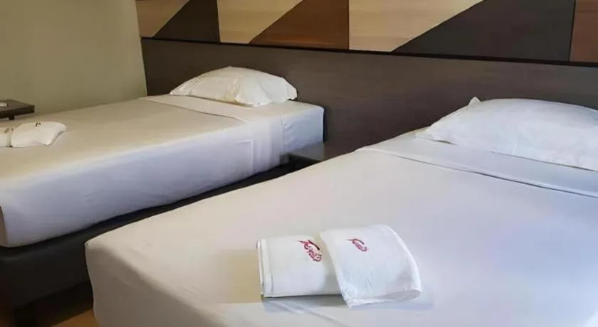 Bed in Travelite Hotel Legarda