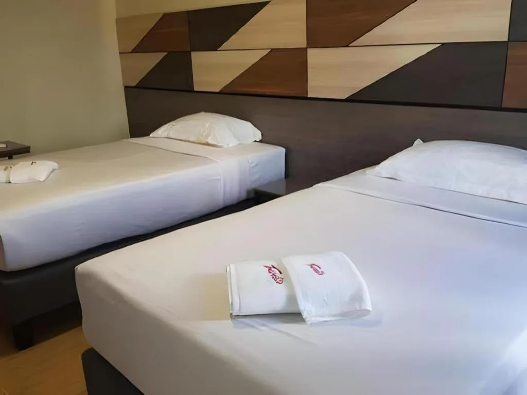 Bed in Travelite Hotel Legarda