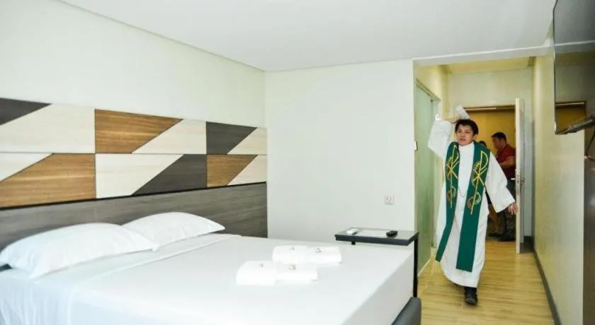 Bed in Travelite Hotel Legarda