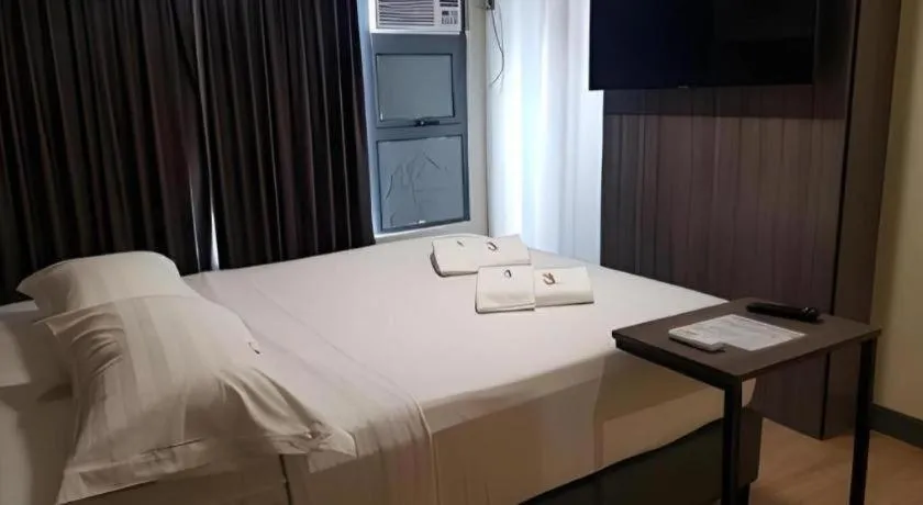 Bed in Travelite Hotel Legarda