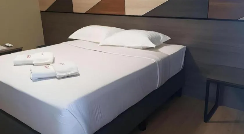 Bed in Travelite Hotel Legarda