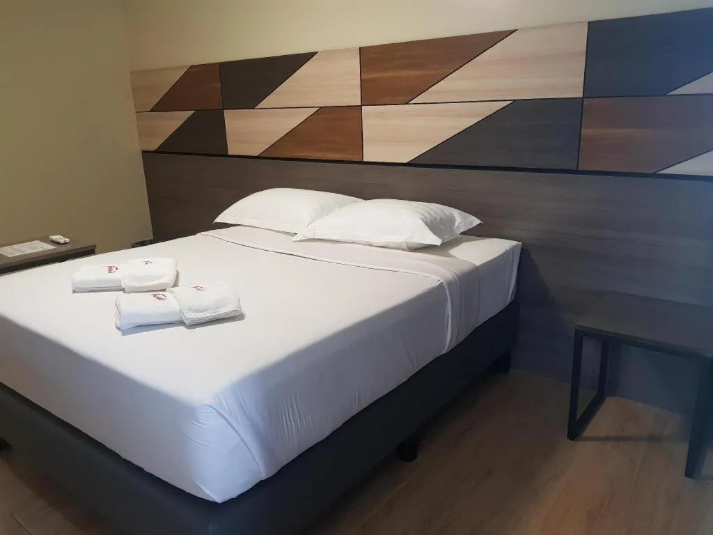 Bed in Travelite Hotel Legarda