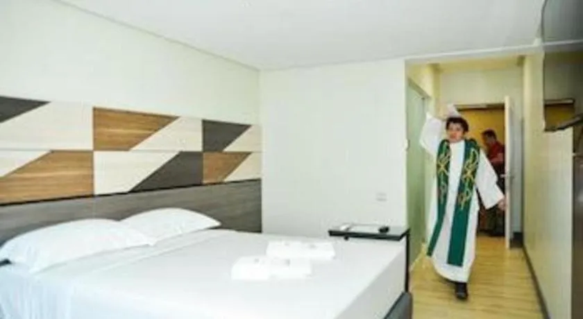 Bed in Travelite Hotel Legarda