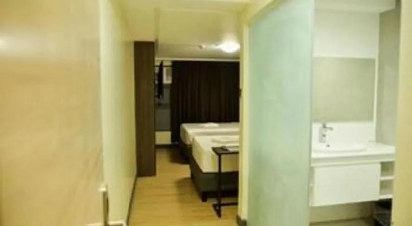 Bed in Travelite Hotel Legarda