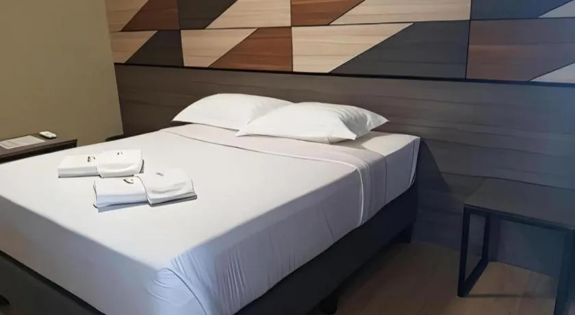 Bed in Travelite Hotel Legarda