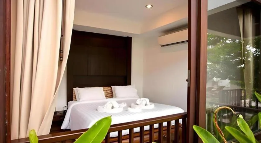 Bed in Maryoo Samui Hotel