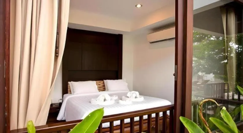 Bed in Maryoo Samui Hotel