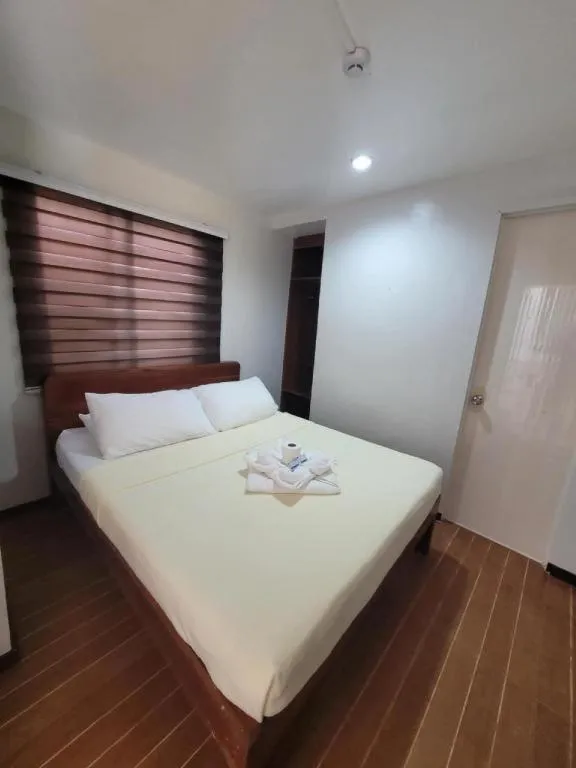 Bed in La Bella Casa Boracay Hotel