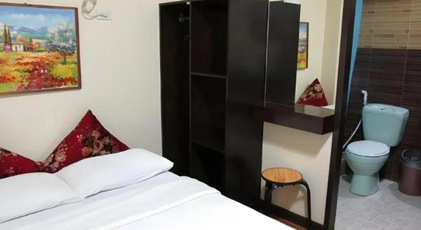 Bed in La Bella Casa Boracay Hotel