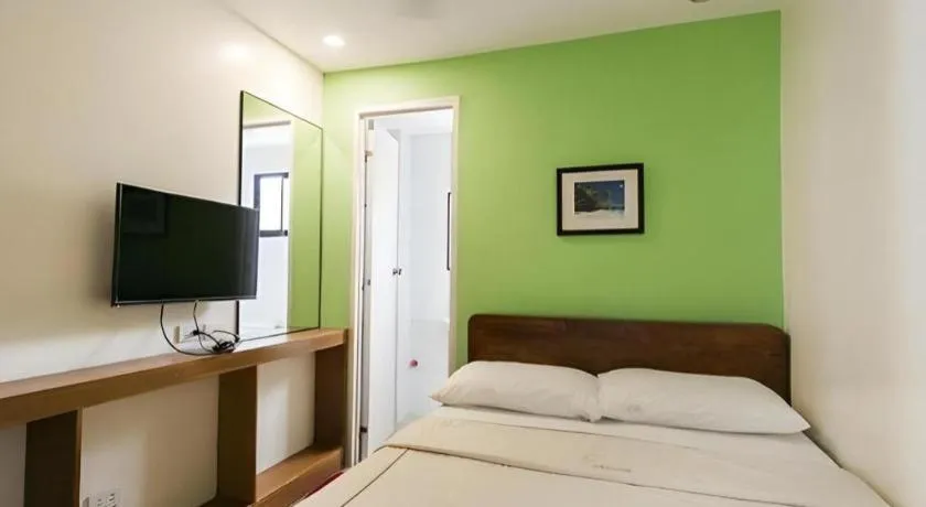 Bed in La Bella Casa Boracay Hotel