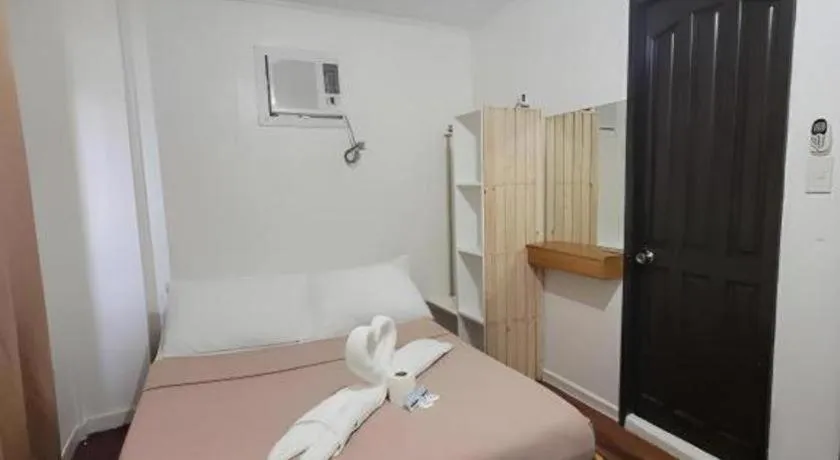 Bed in La Bella Casa Boracay Hotel