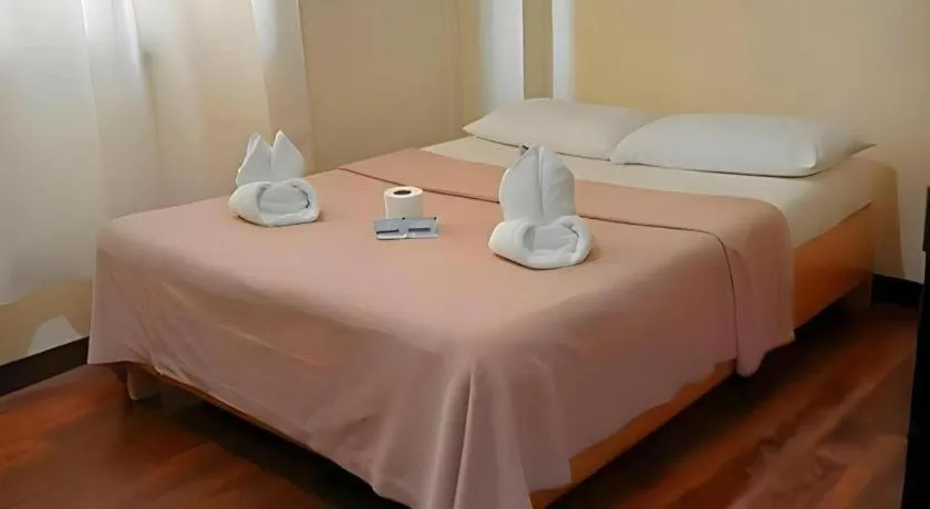Bed in La Bella Casa Boracay Hotel