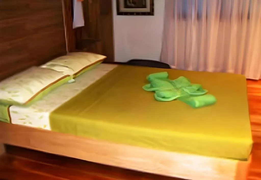 Bed in La Bella Casa Boracay Hotel