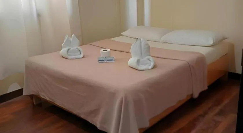 Bed in La Bella Casa Boracay Hotel