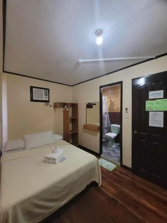 Bed in La Bella Casa Boracay Hotel