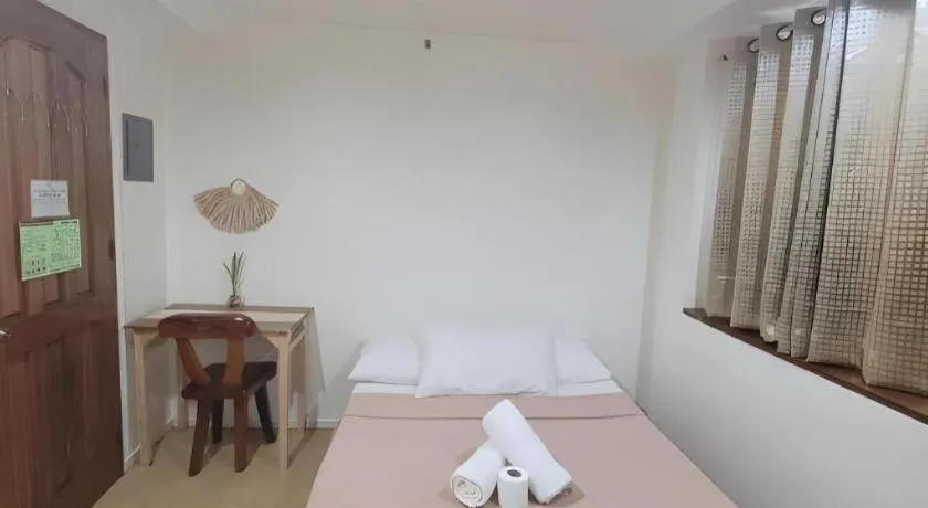 Bed in La Bella Casa Boracay Hotel