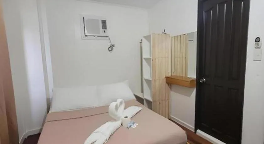 Bed in La Bella Casa Boracay Hotel