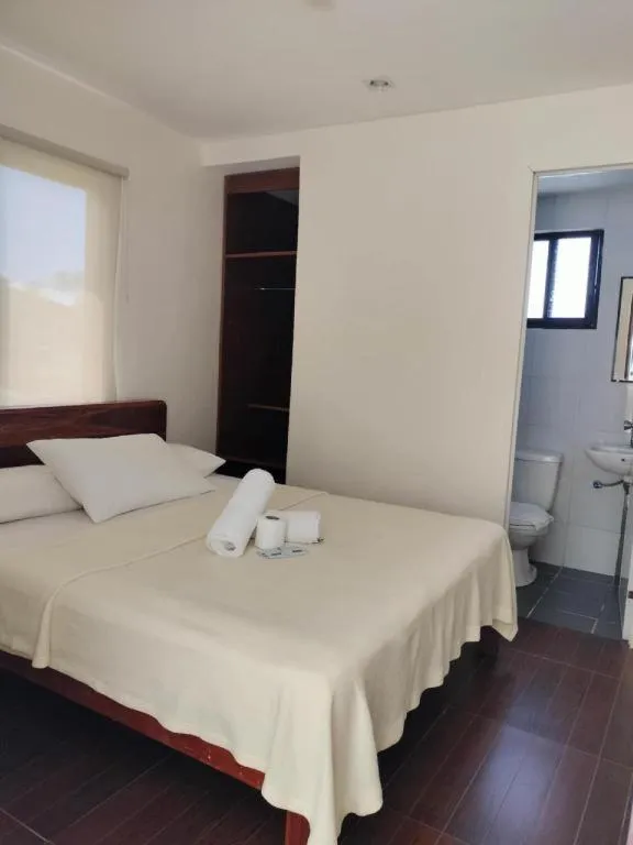 Bed in La Bella Casa Boracay Hotel