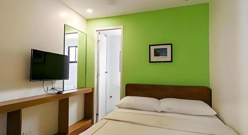 Bed in La Bella Casa Boracay Hotel