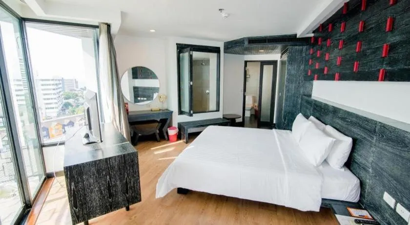 Bed in The Sez Hotel Bangsaen