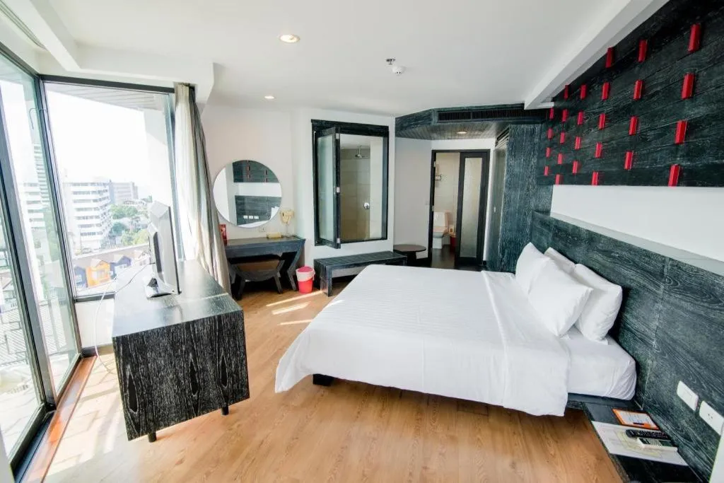 Bed in The Sez Hotel Bangsaen