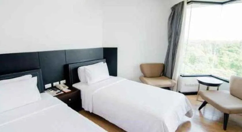 Bed in The Sez Hotel Bangsaen