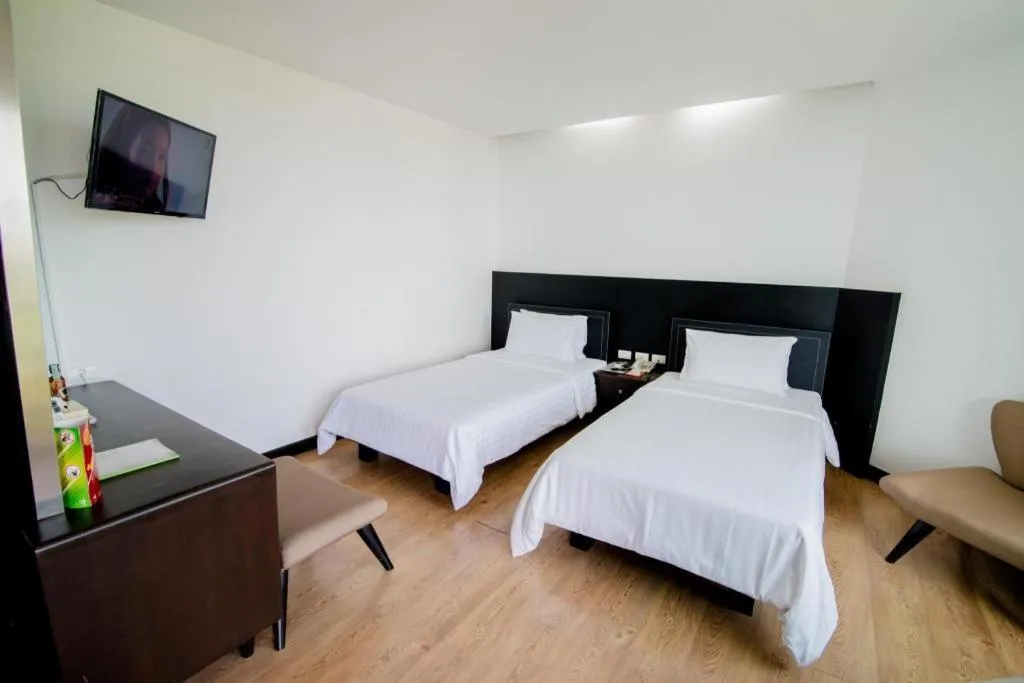 Bed in The Sez Hotel Bangsaen