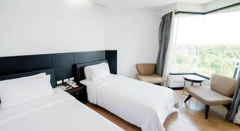 Bed in The Sez Hotel Bangsaen