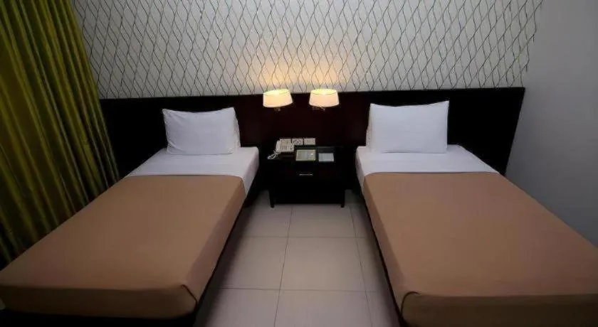 Bed in SMALLVILLE 21 HOTEL