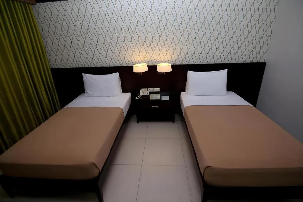 Bed in SMALLVILLE 21 HOTEL