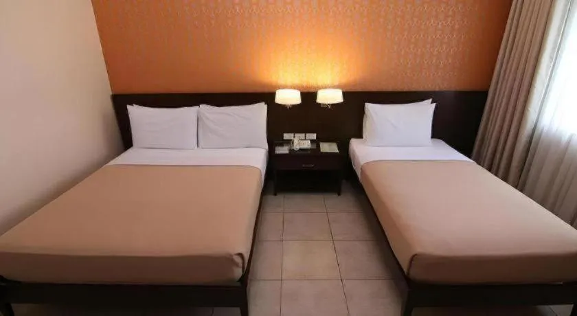 Bed in SMALLVILLE 21 HOTEL