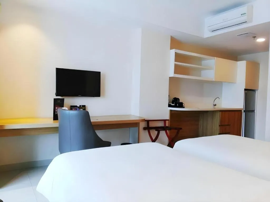 Bed in Wing Hotel Kualanamu Airport