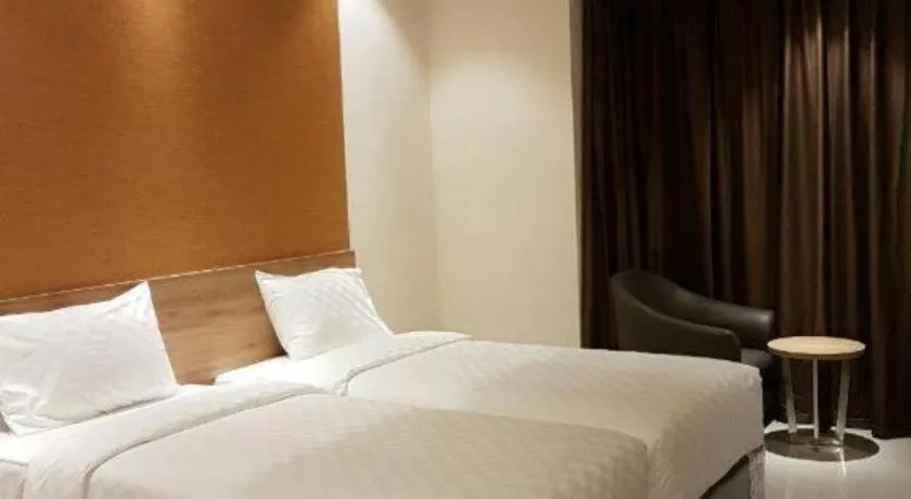 Bed in Wing Hotel Kualanamu Airport