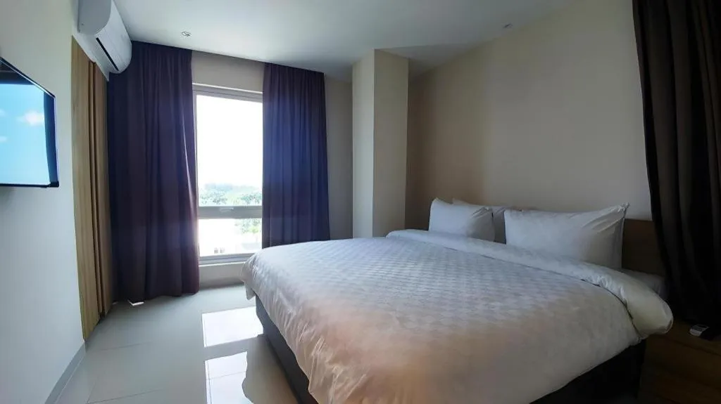 Bed in Wing Hotel Kualanamu Airport