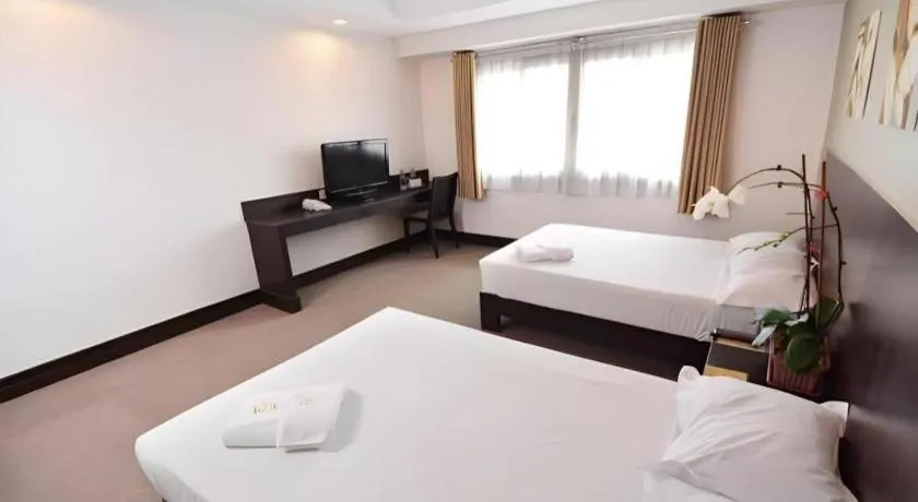 Bed in Citylight Hotel