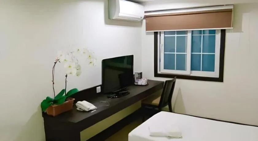 Bed in Citylight Hotel