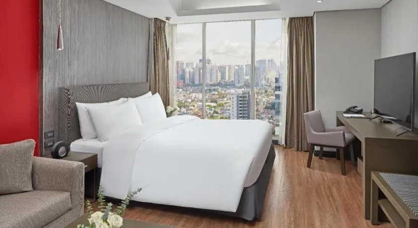 Bed in F1 Hotel Manila