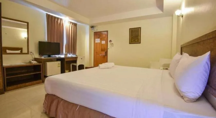 Bed in Trat Center Hotel