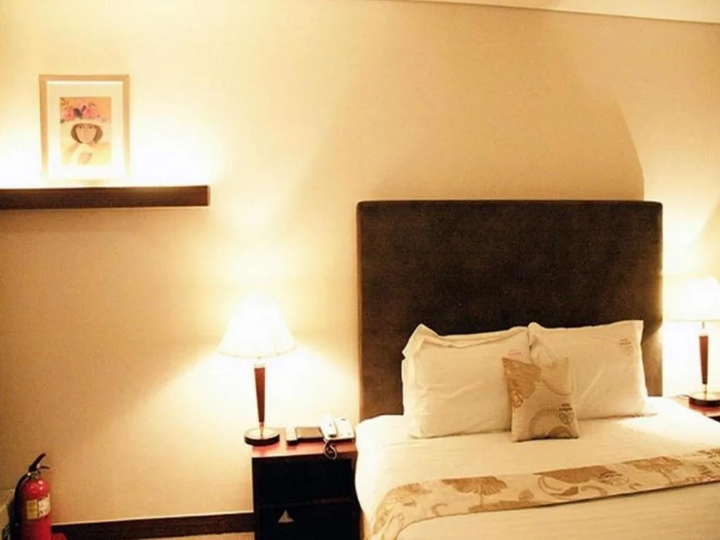 Bed in Hotel Sunshine