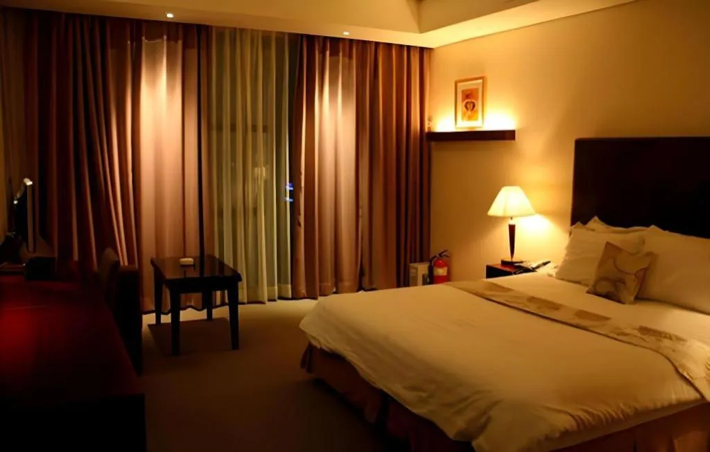 Bed in Hotel Sunshine