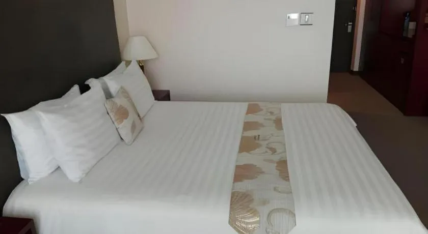 Bed in Hotel Sunshine