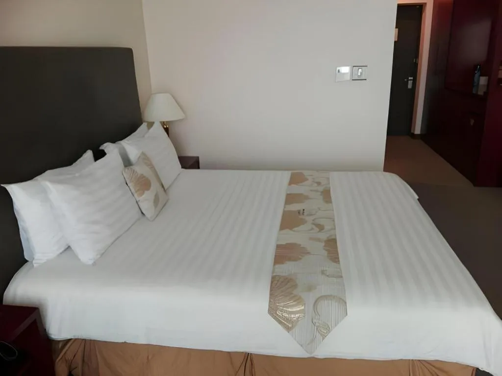 Bed in Hotel Sunshine