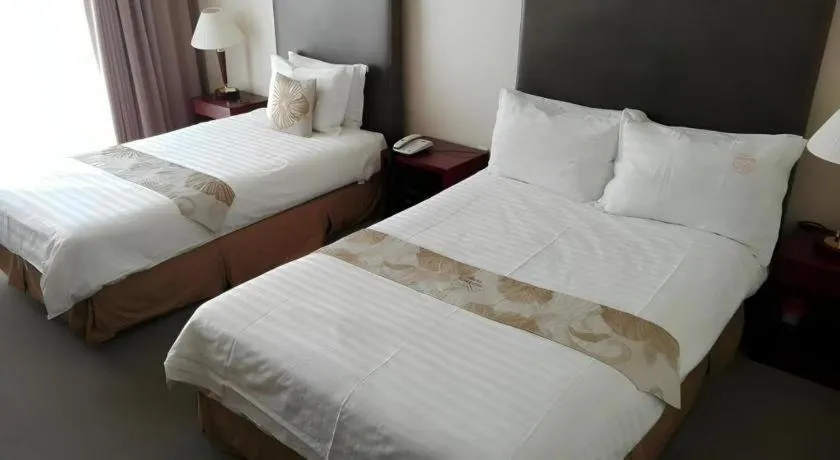 Bed in Hotel Sunshine