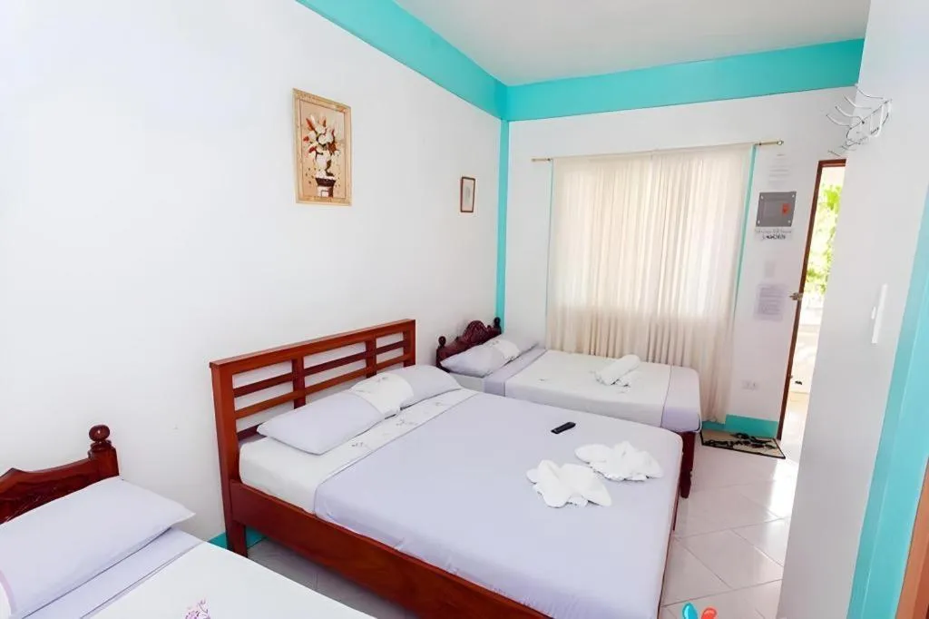 Bed in Palm Grove Saud Holiday Complex Hotel