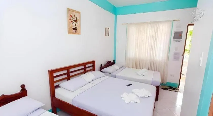 Bed in Palm Grove Saud Holiday Complex Hotel