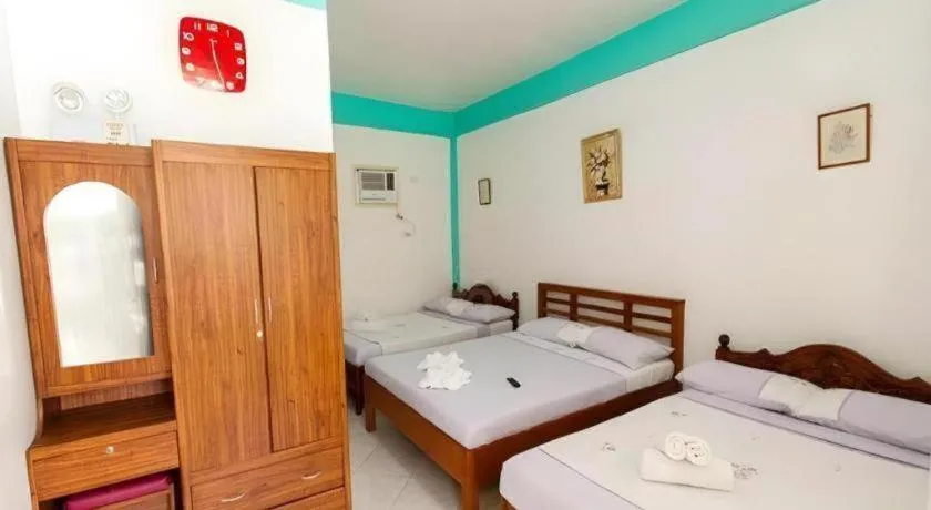 Bed in Palm Grove Saud Holiday Complex Hotel