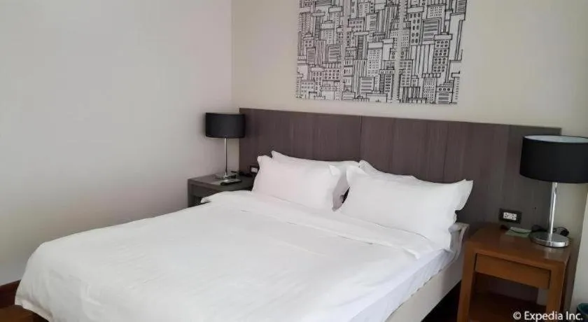 Bed in Newtown Plaza Hotel