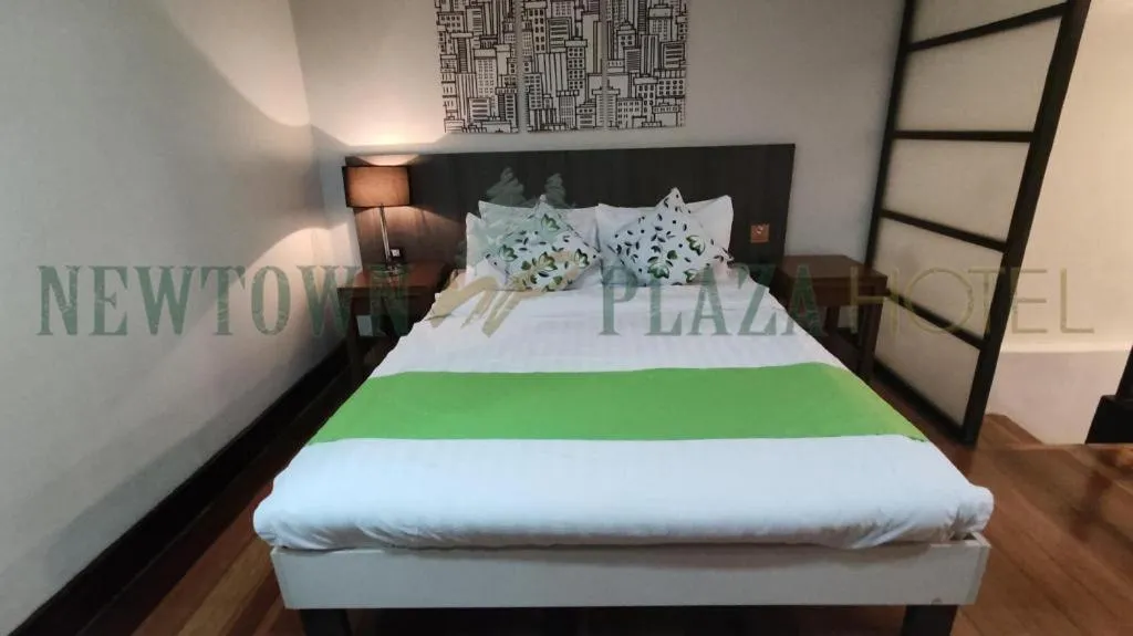 Bed in Newtown Plaza Hotel