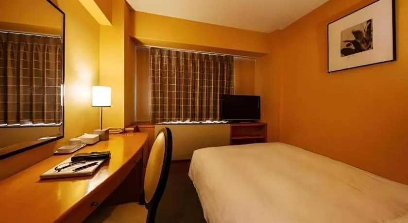 Bed in Diamond Hotel Tokyo